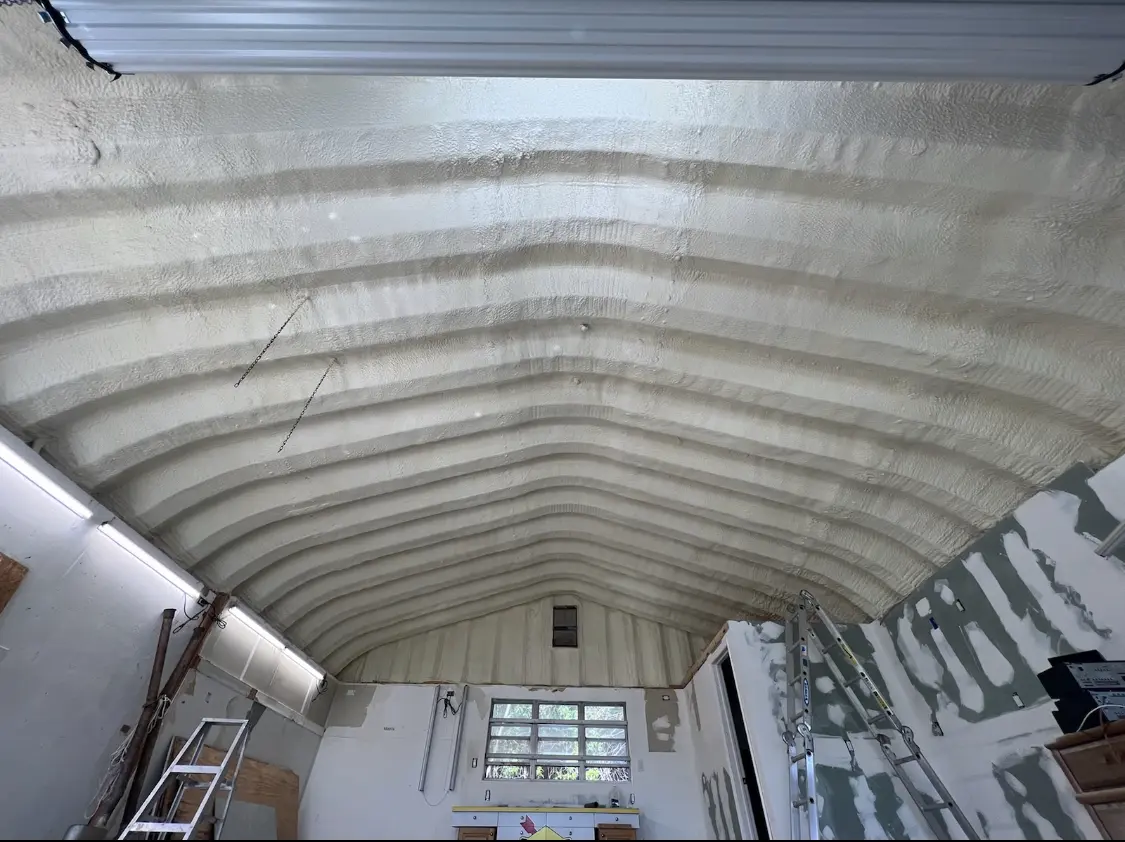 Spray polyurethane foam applied to the underside of a metal roof deck in Hot Springs